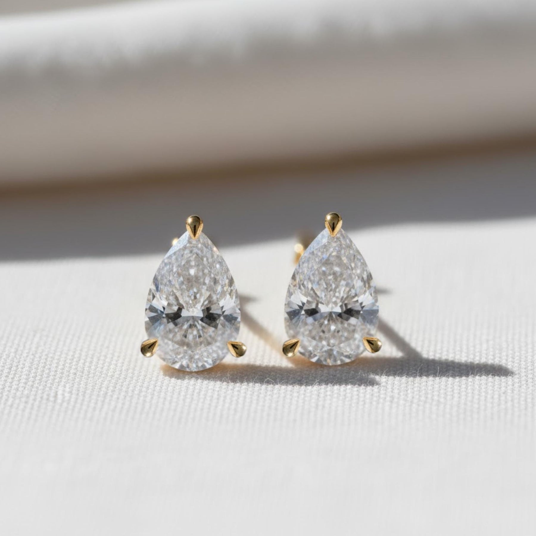 1 CT Pear Lab Grown Diamond Stud Earrings: 14k White Gold 3-Prong