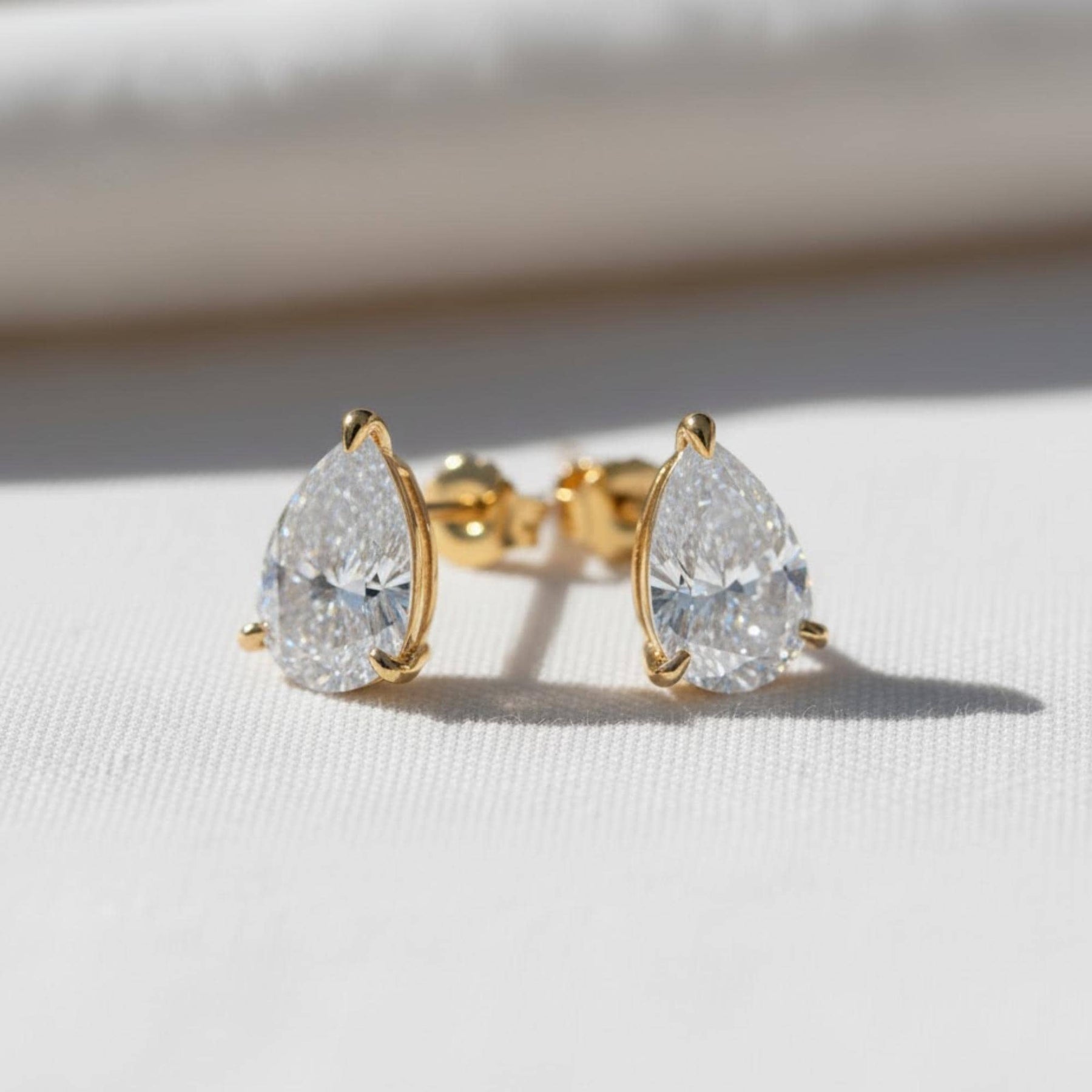 1 CT Pear Lab Grown Diamond Stud Earrings: 14k White Gold 3-Prong