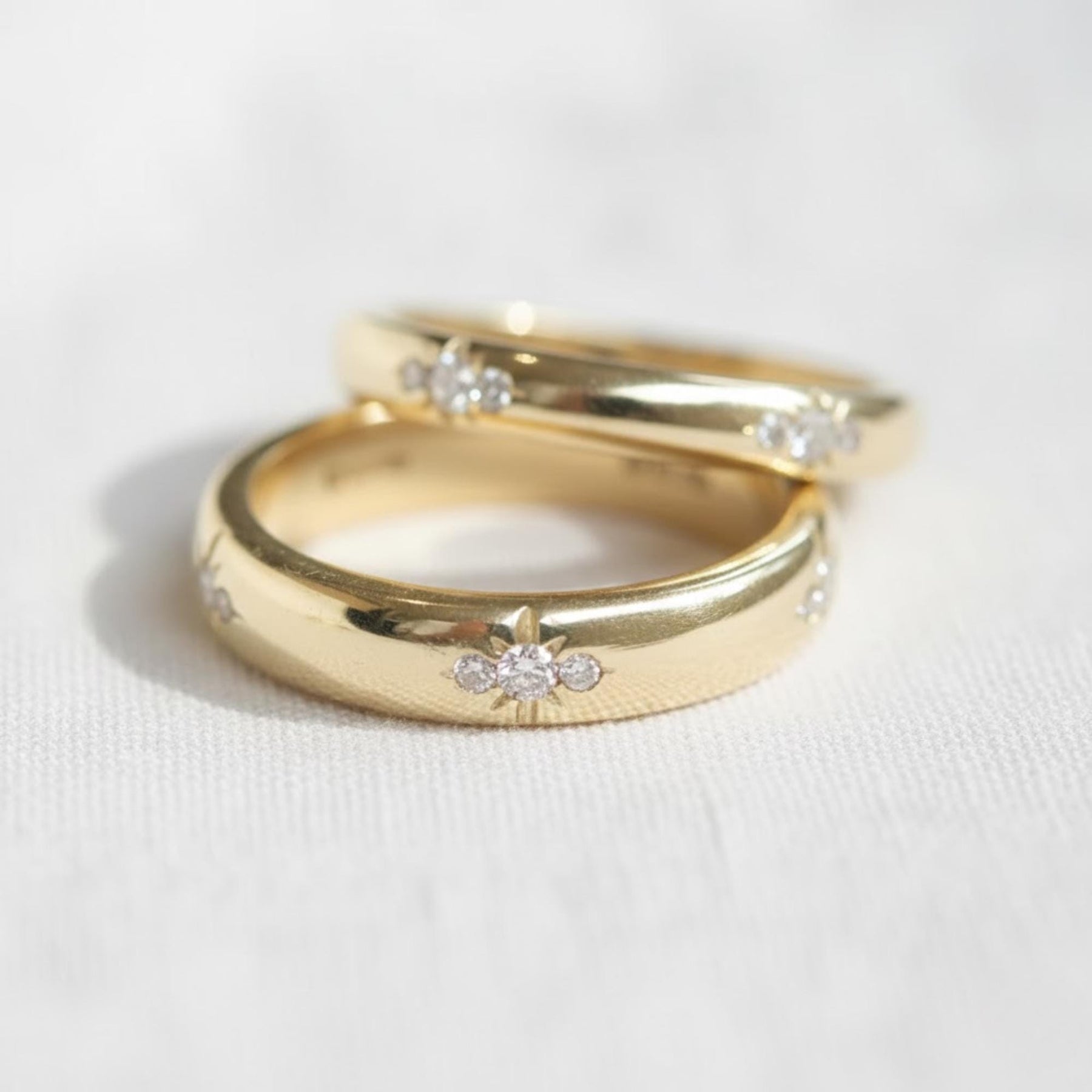The Celestia 2-Piece Matching Star Diamond Couple Ring Set in 10K or 14K Gold
