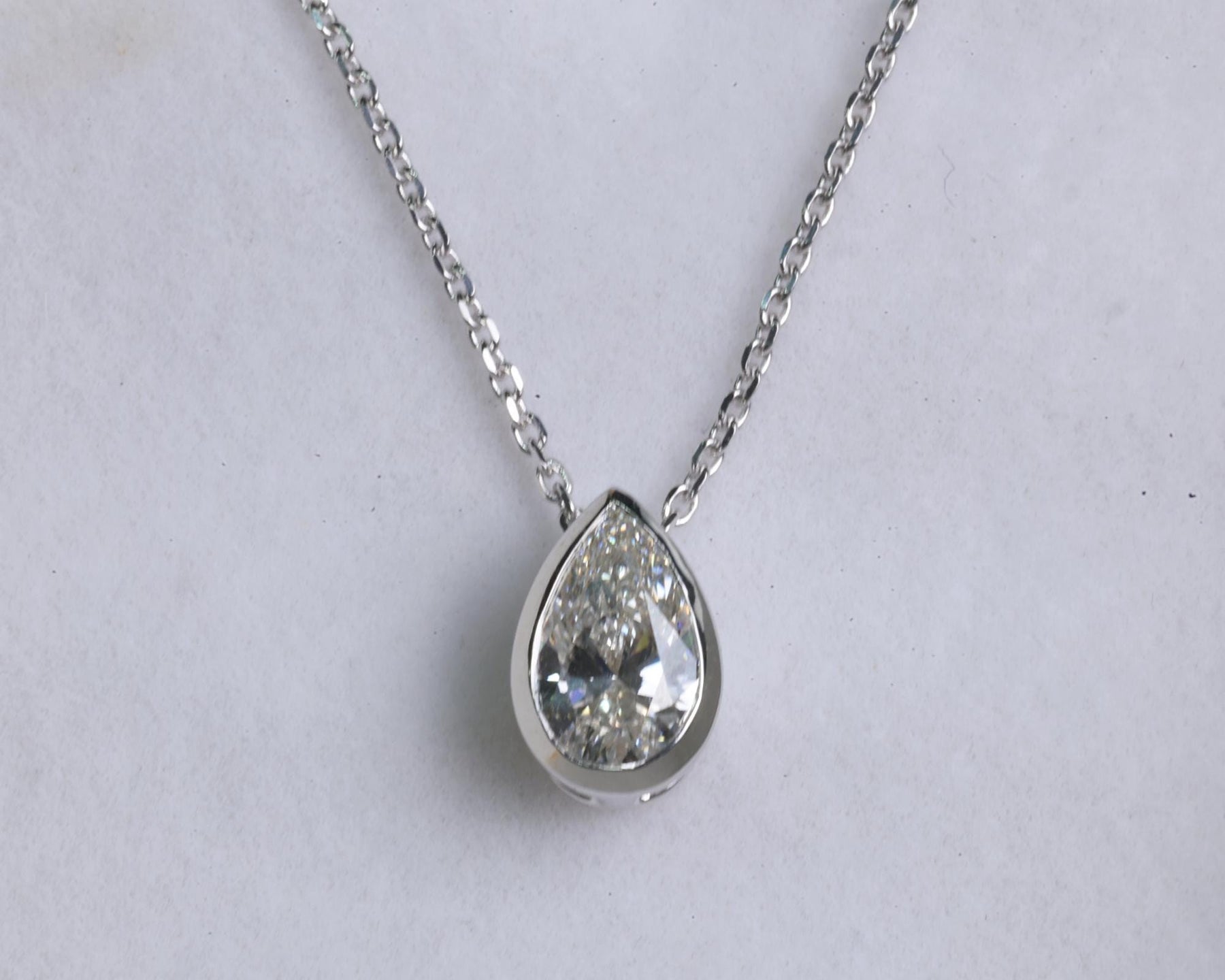 2 Carat Pear Lab Grown Diamond Necklace: 14k Yellow Gold Bezel Solitaire