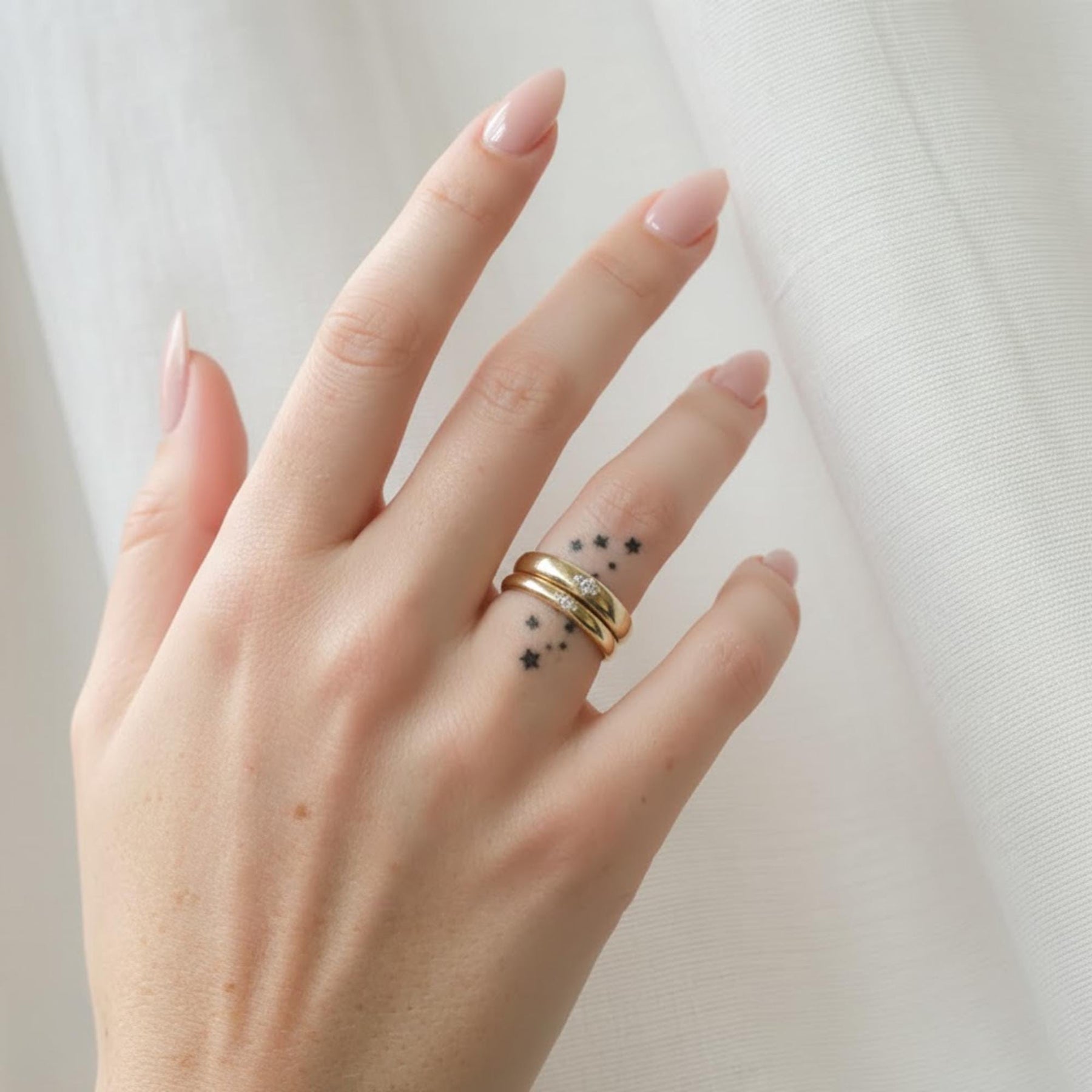 The Celestia 2-Piece Matching Star Diamond Couple Ring Set in 10K or 14K Gold