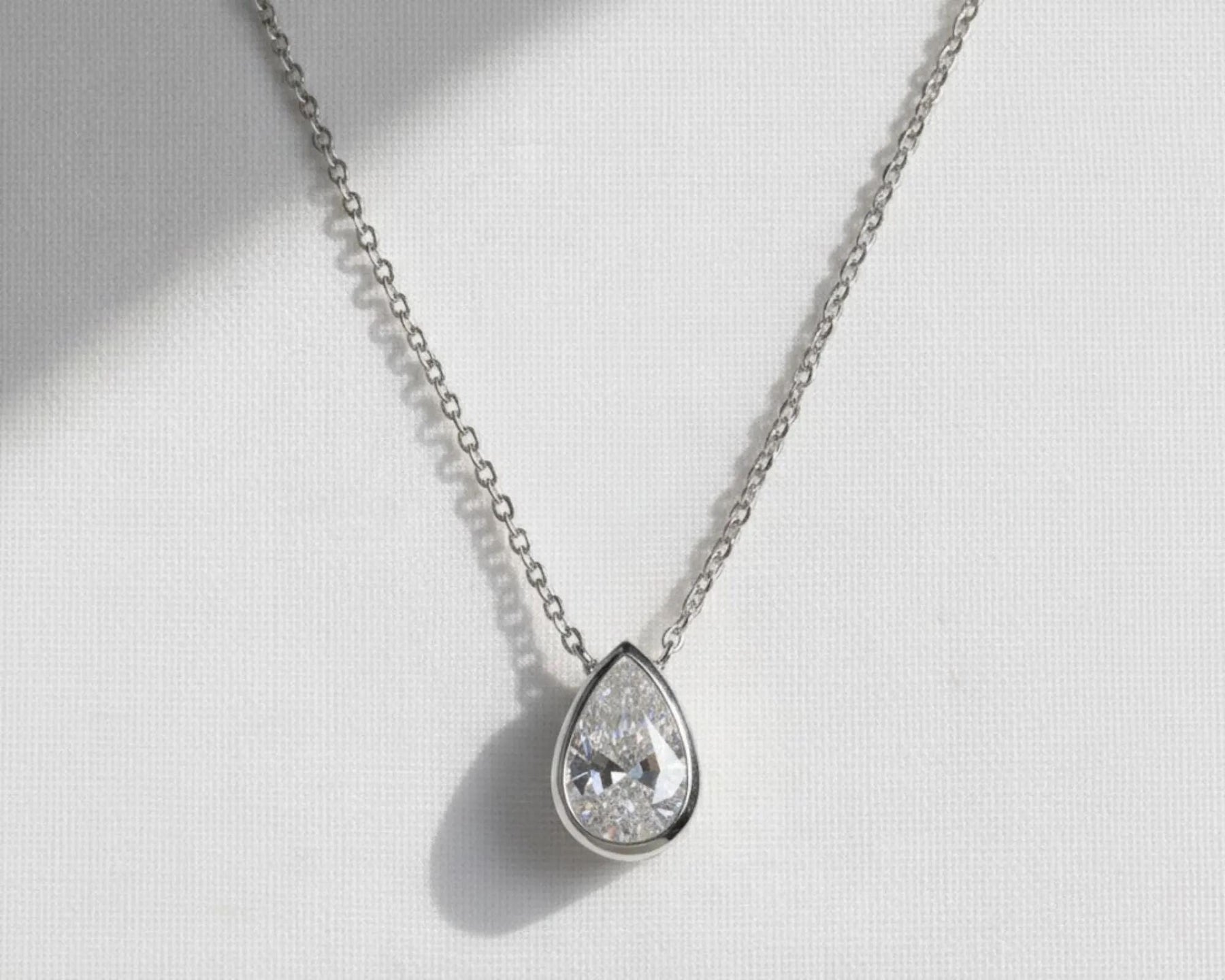 2 Carat Pear Lab Grown Diamond Necklace: 14k Yellow Gold Bezel Solitaire