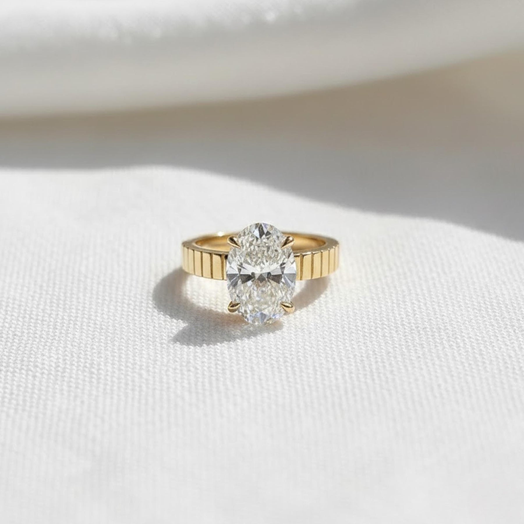 The Celestine 3-Carat Oval-Cut Lab-Grown Diamond Solitaire Engagement Ring with a 3.5mm Two-Tone Cigar Band in 10K or 14K Solid Gold