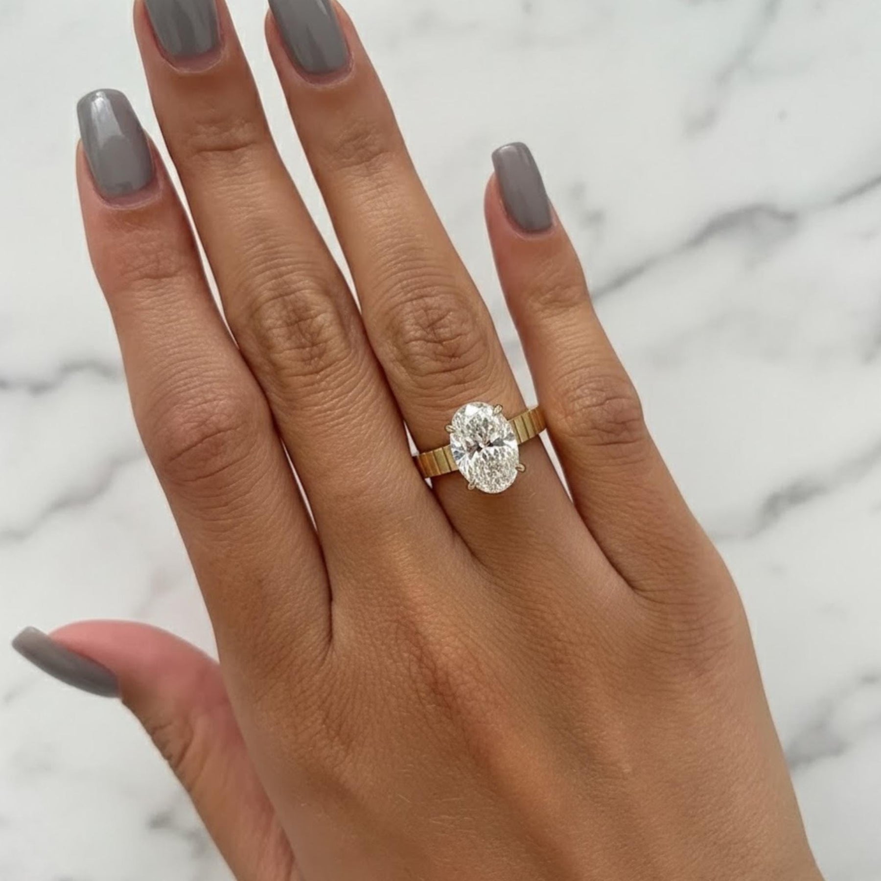 The Celestine 3-Carat Oval-Cut Lab-Grown Diamond Solitaire Engagement Ring with a 3.5mm Two-Tone Cigar Band in 10K or 14K Solid Gold