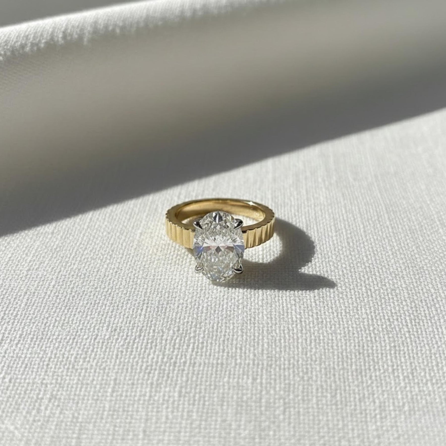The Celestine 3-Carat Oval-Cut Lab-Grown Diamond Solitaire Engagement Ring with a 3.5mm Two-Tone Cigar Band in 10K or 14K Solid Gold