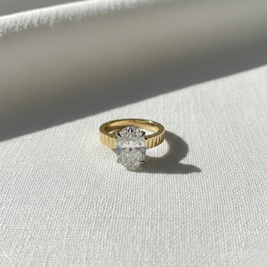 The Celestine 3-Carat Oval-Cut Lab-Grown Diamond Solitaire Engagement Ring with a 3.5mm Two-Tone Cigar Band in 10K or 14K Solid Gold