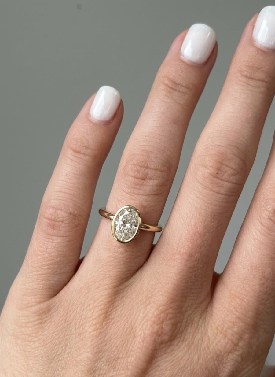 The Evelisse IGI-Certified F–VS1 Oval-Cut Lab-Grown Diamond Solitaire Engagement Ring in 10K or 14K Solid Gold